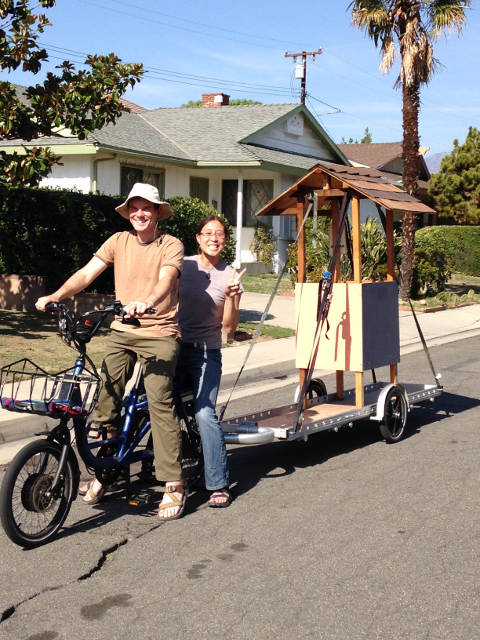 carrying a small shed on a bike trailer